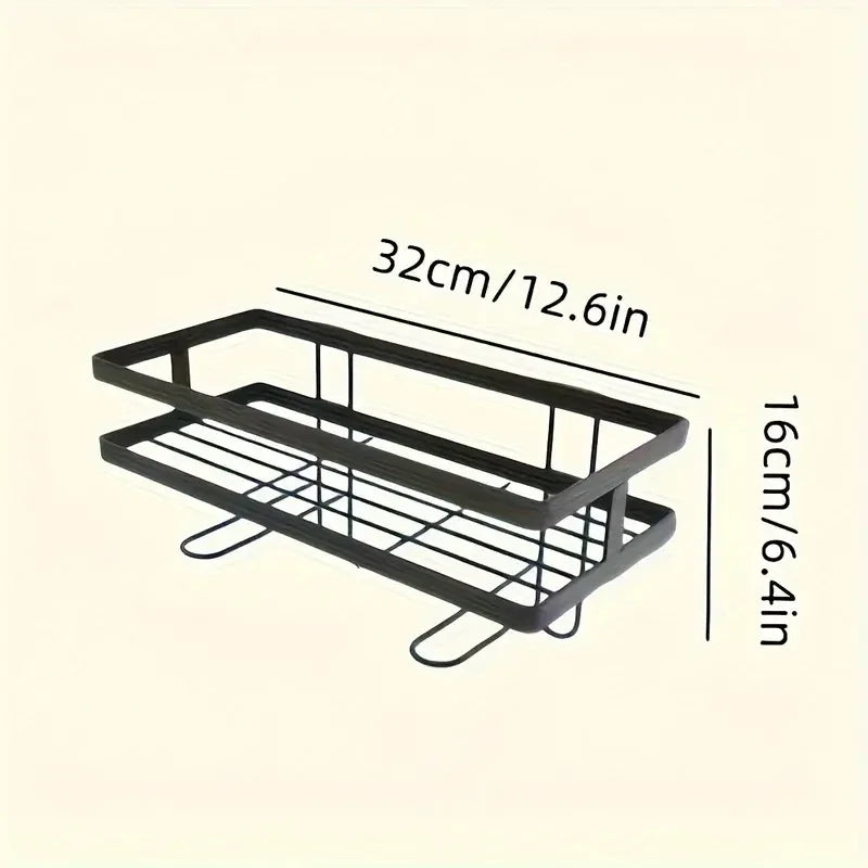 black metal over-toilet shelf showing measurements of 32cm by 16cm