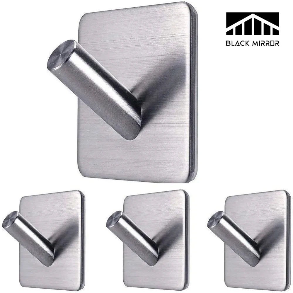 Set of four brushed stainless steel adhesive wall hooks shown on white background