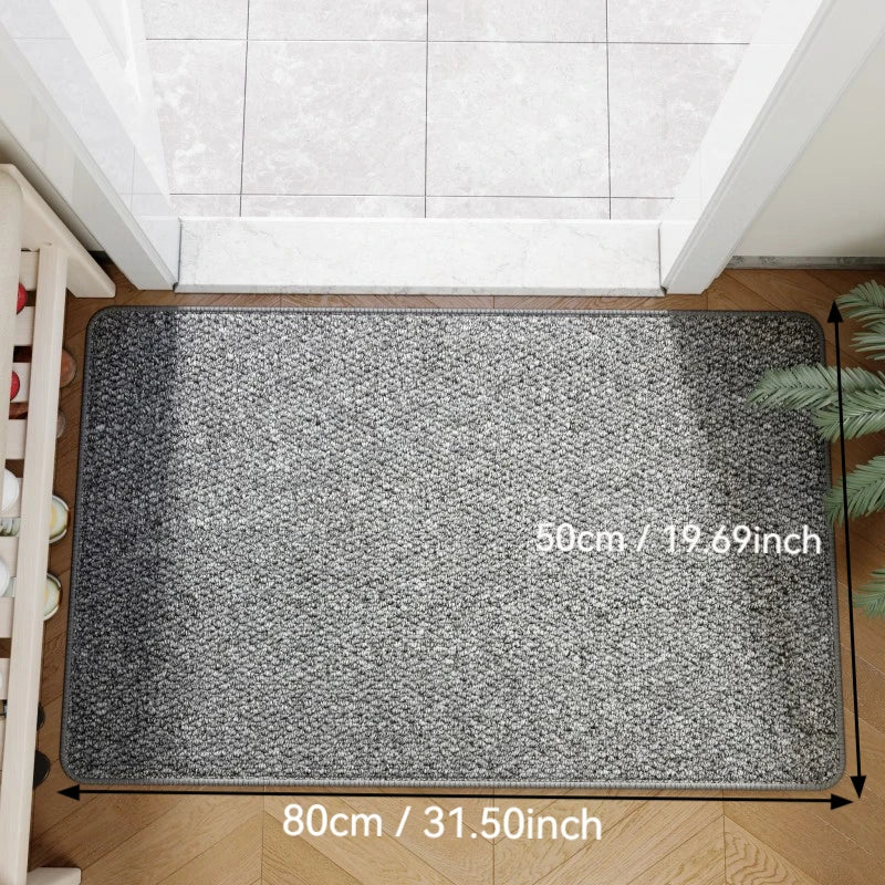 Grey faux jute doormat in entryway with size measurements labeled on surface