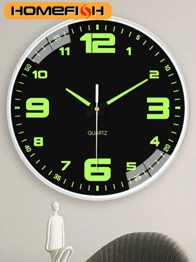 Black wall clock with luminous green numerals and hands, hung above a modern chair