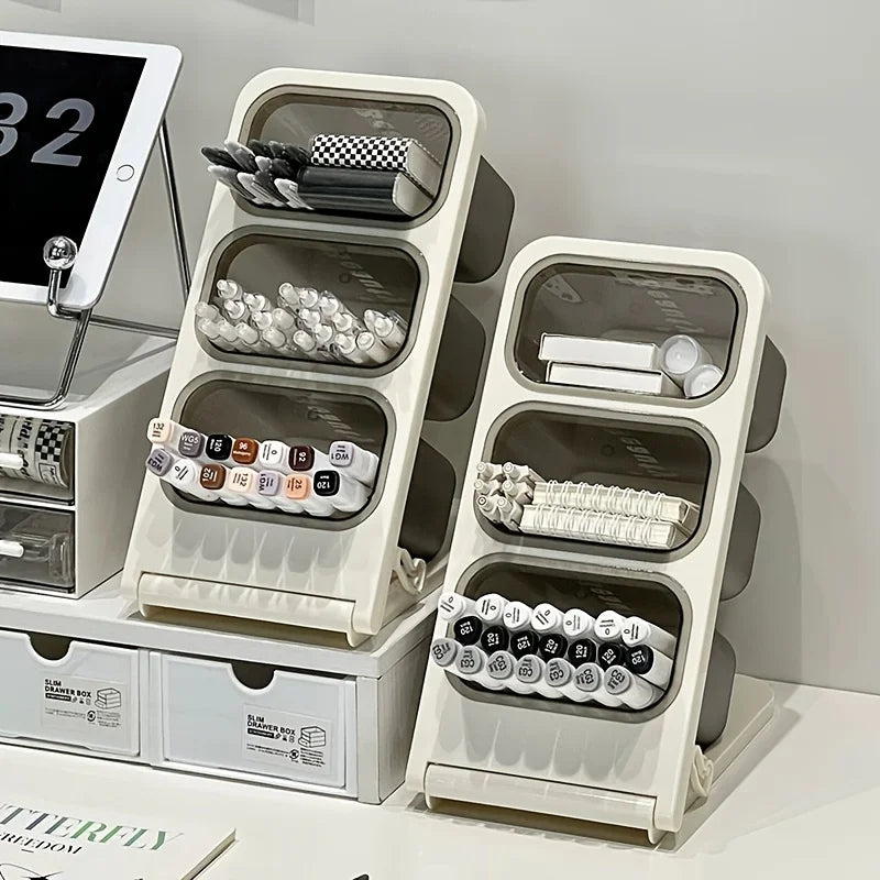 two large capacity angled desk organizers on a workspace filled with stationery and markers