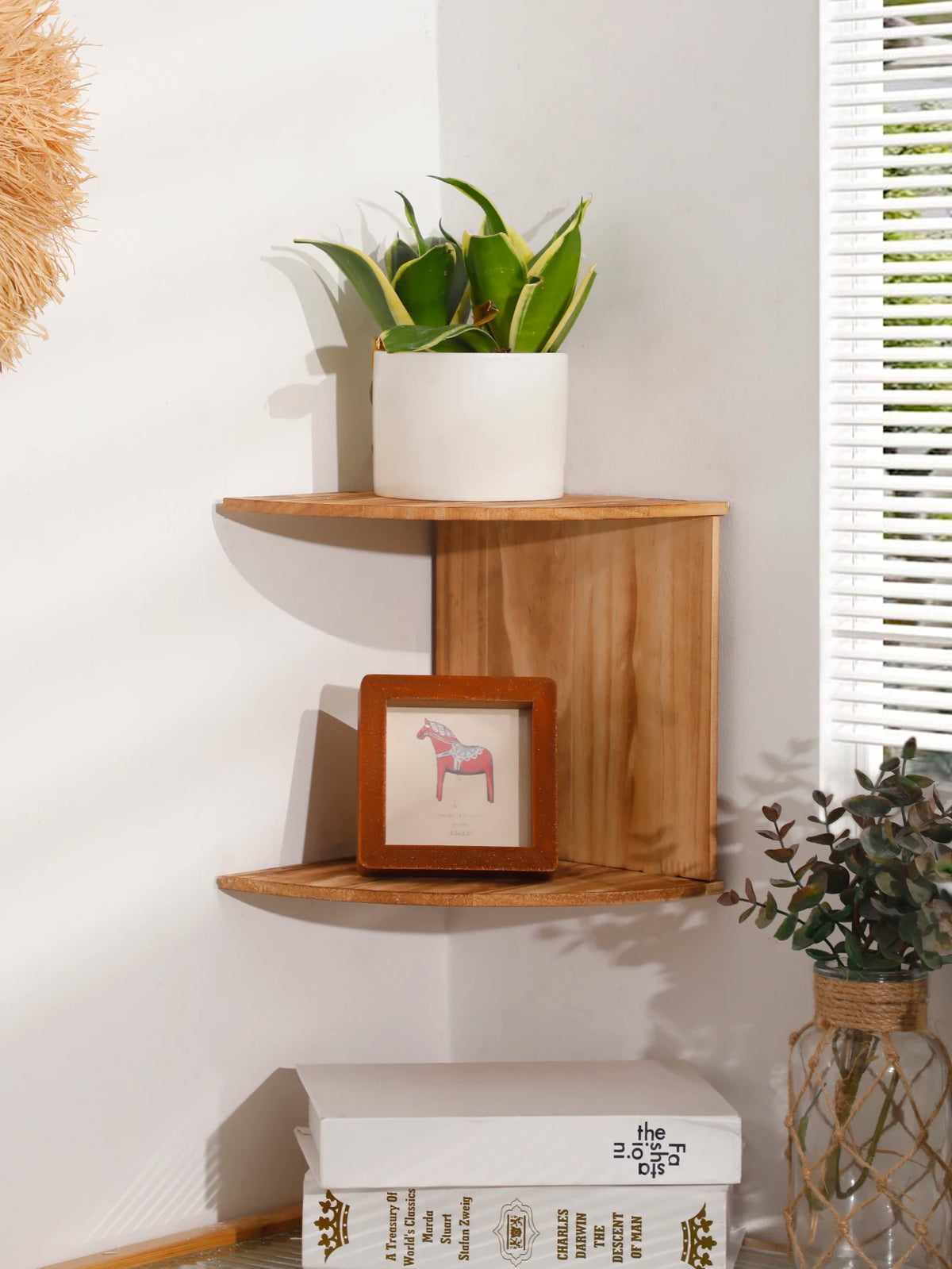 2-tier wooden corner shelf with plant and framed art, styled for a cozy room