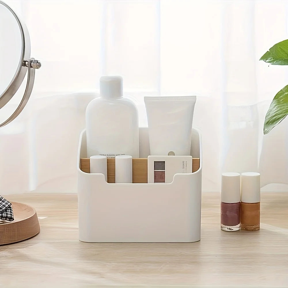 White compartment organizer caddy holding toiletries and makeup on a vanity table