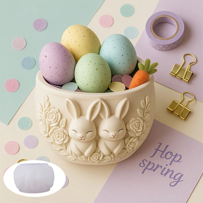 Bunny couple planter pot holding pastel Easter eggs with silicone mold beside it