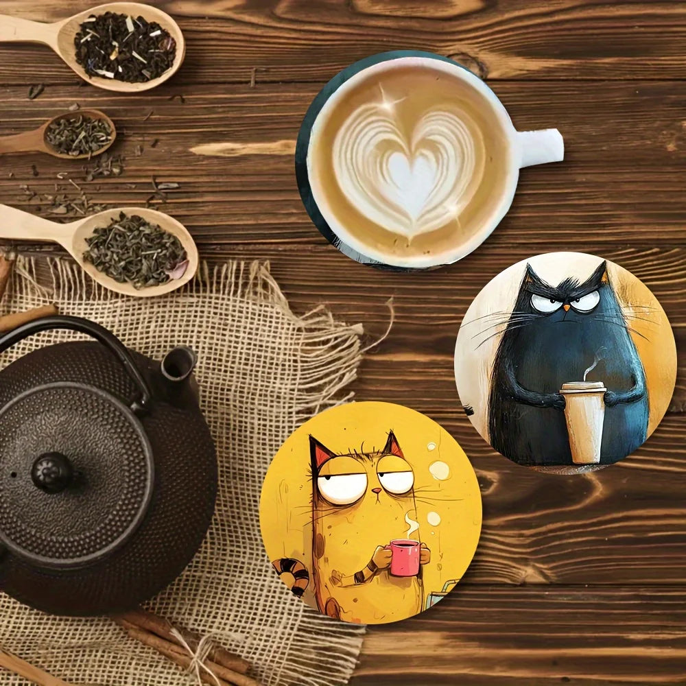 Cat print wood coasters on a wooden table with tea set and loose leaf tea