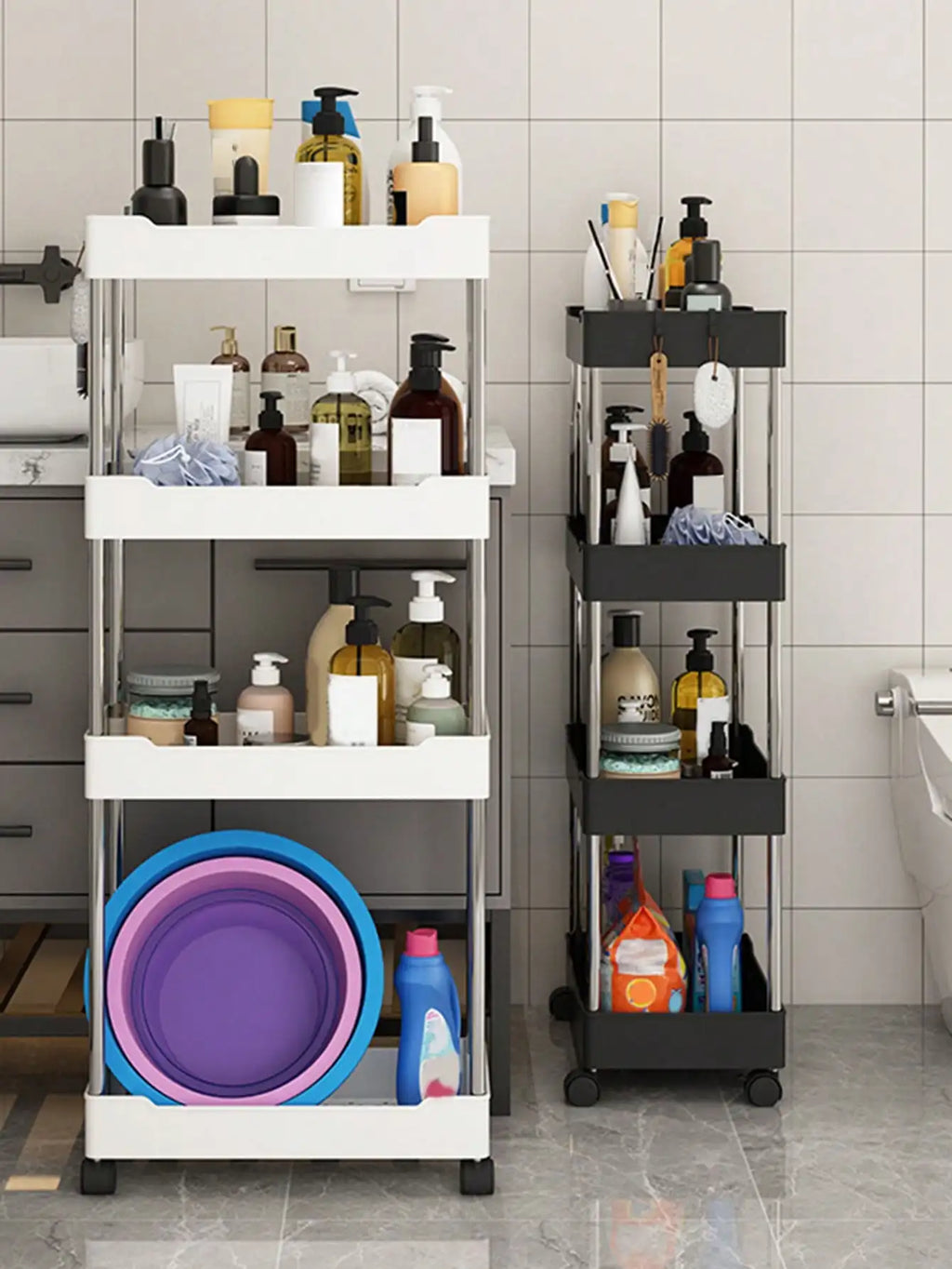 white and black rolling utility carts of different heights filled with bath supplies next to a sink