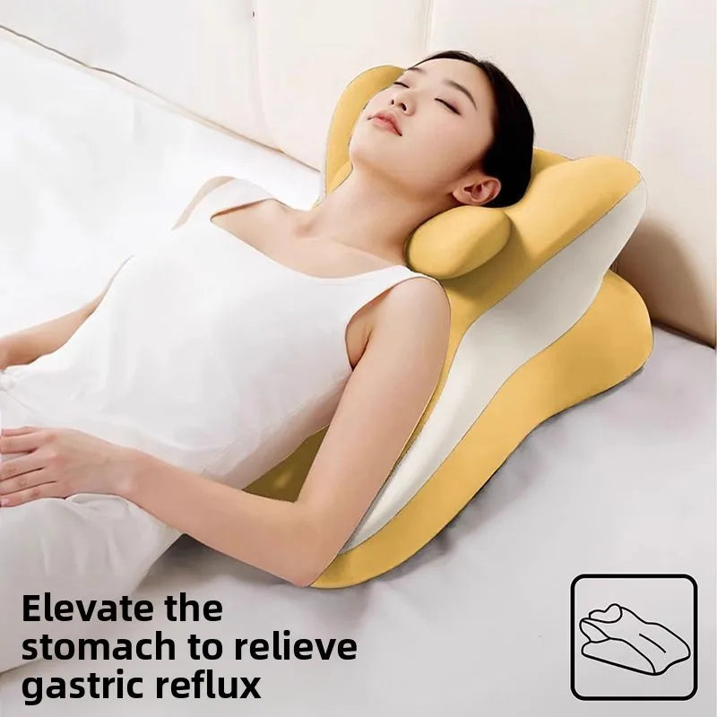 Woman reclining on bed with memory foam backrest pillow supporting her head and neck