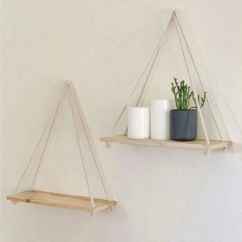 Beige rope wall shelves with minimalist decor and candles in a cozy setting