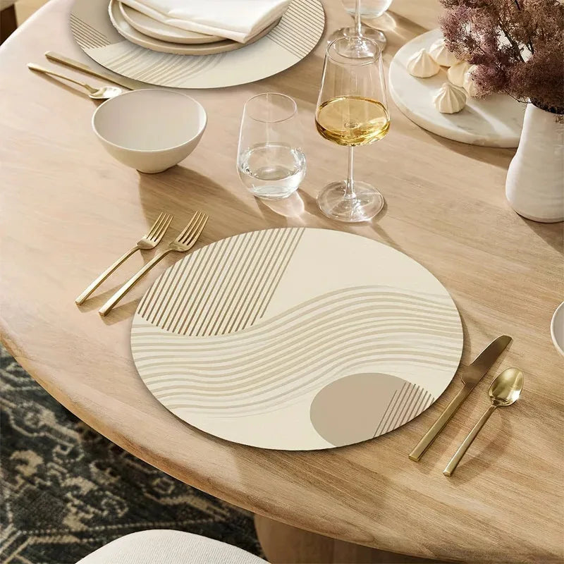 Round neutral placemat with wave and stripe design at a modern dining setting