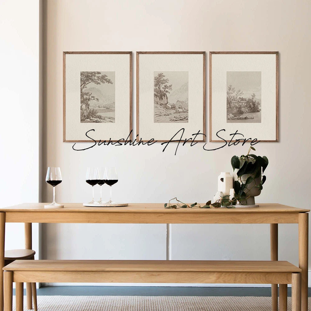 Neutral landscape canvas art prints styled above a dining table for calm wall decor
