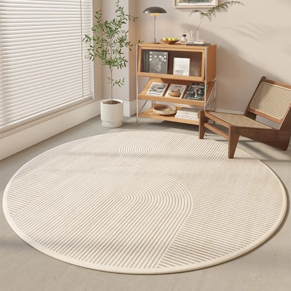 neutral minimalist round rug with subtle abstract geometric lines in a modern living space