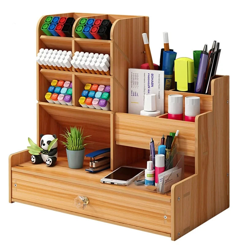 Cherry wood finish wooden desk organizer with drawer, filled with pens, markers, and desk accessories