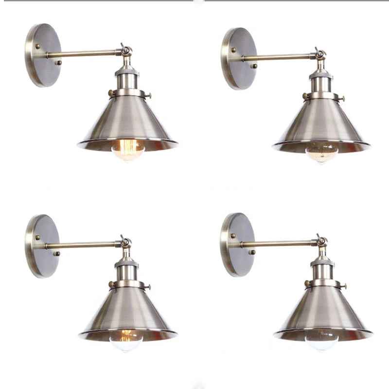 Set of four brushed nickel wall sconces with adjustable arms