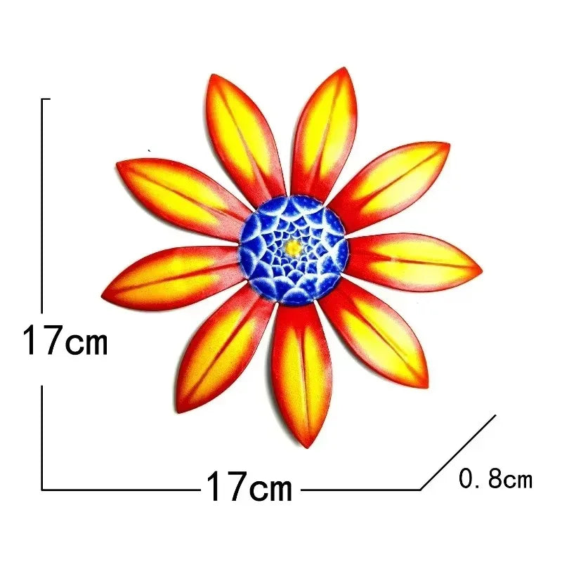 Orange metal flower wall ornament with 17cm x 17cm dimensions shown