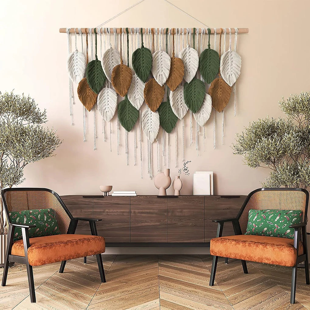large woven macrame wall hanging with leaf pattern above a credenza in a modern living room