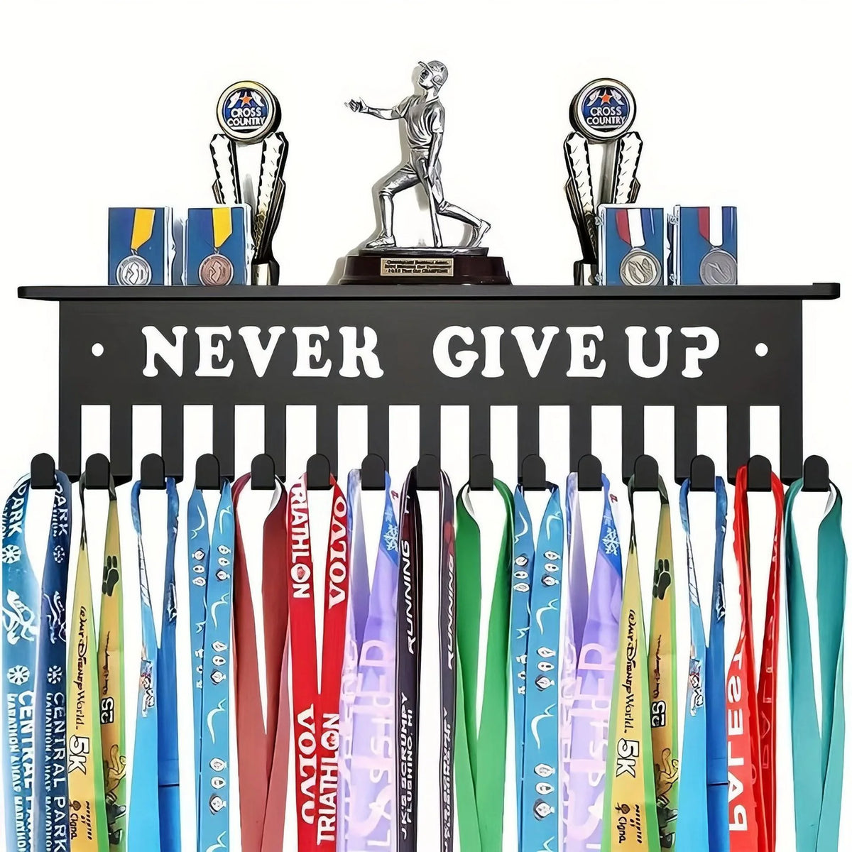 Black iron wall-mounted medal and trophy rack with 'NEVER GIVE UP' lettering and medals hanging