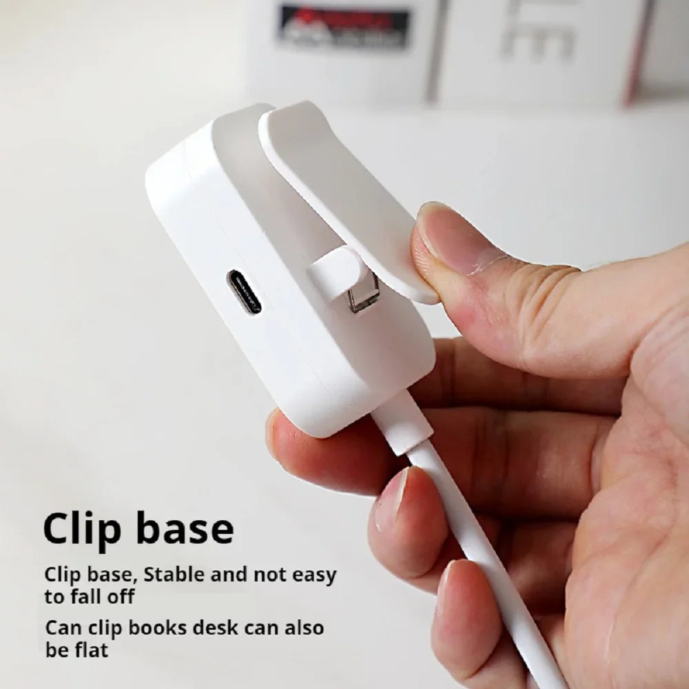 Closeup view of the white clip base and USB charging port of the book light