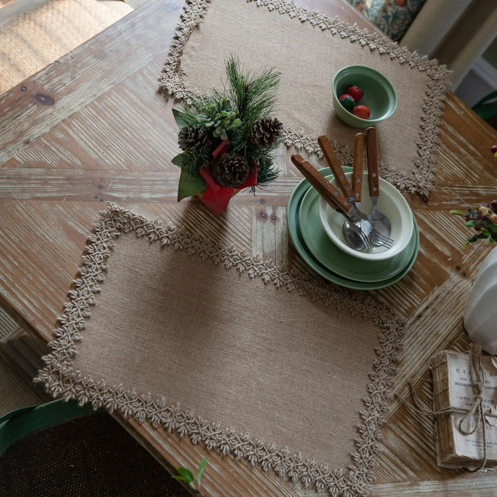 Coordinated jute placemat set with lace edge styled on a country table