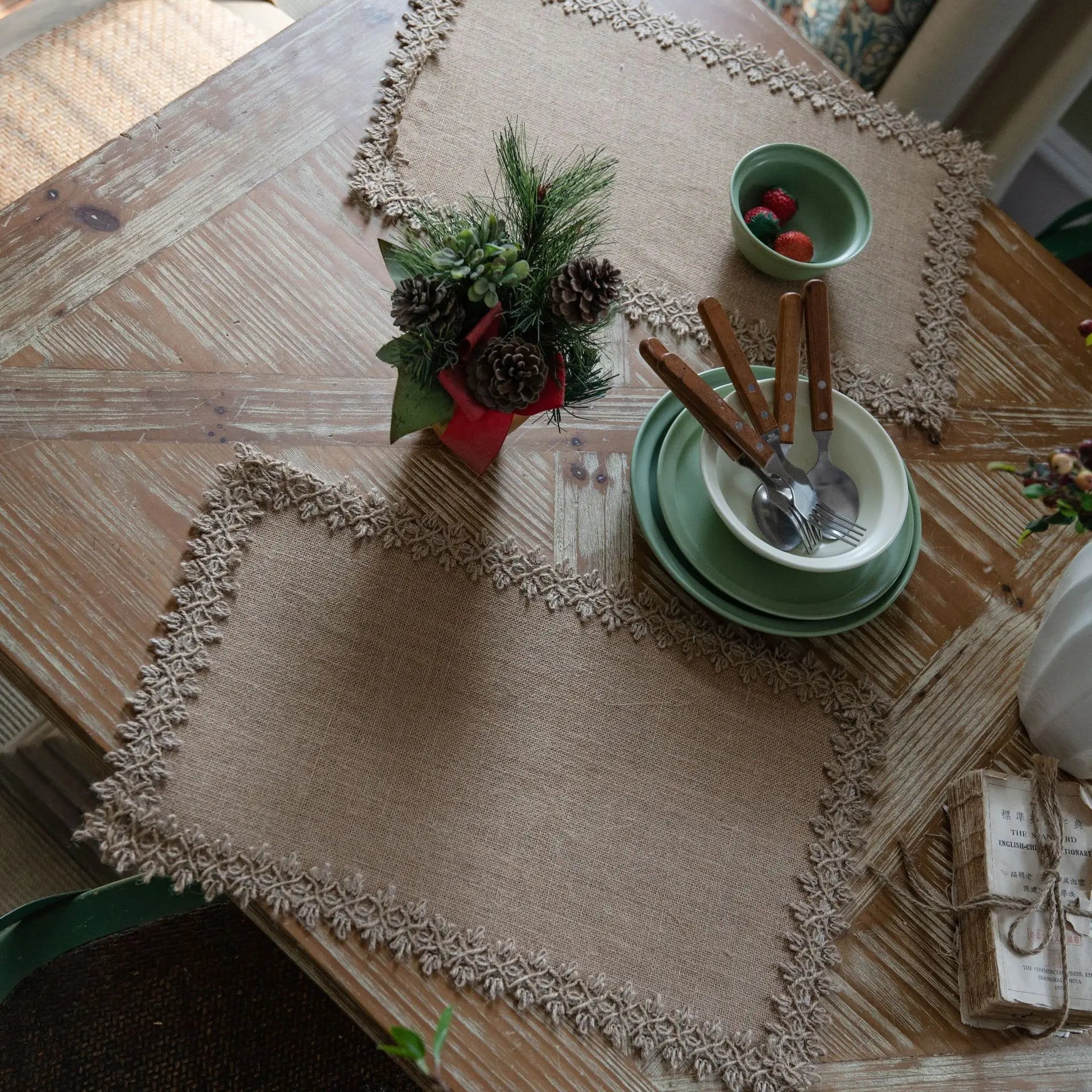 Coordinated jute placemat set with lace edge styled on a country table