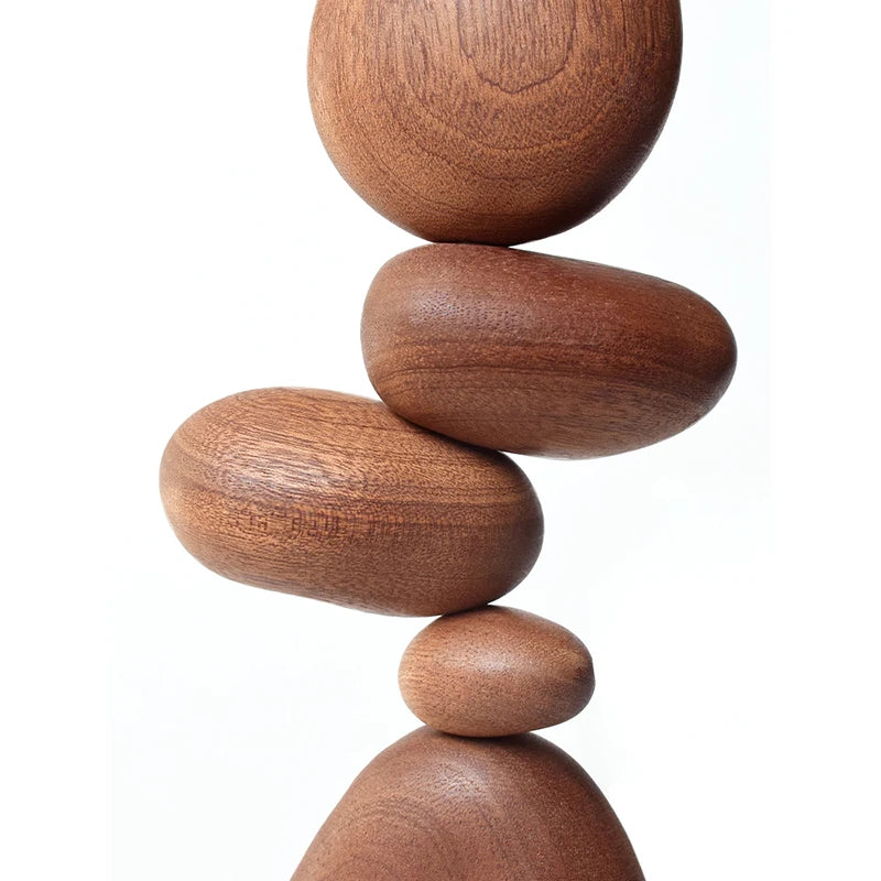 Detail view of the stacked wooden stone pieces from the side