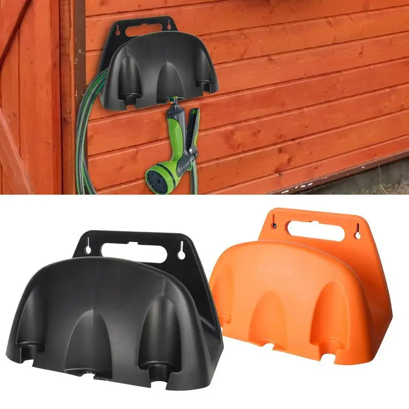Black and orange wall-mounted garden hose holders shown on outdoor shed wall