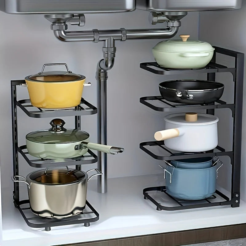 two steel pot racks organizing various pots and pans under sink