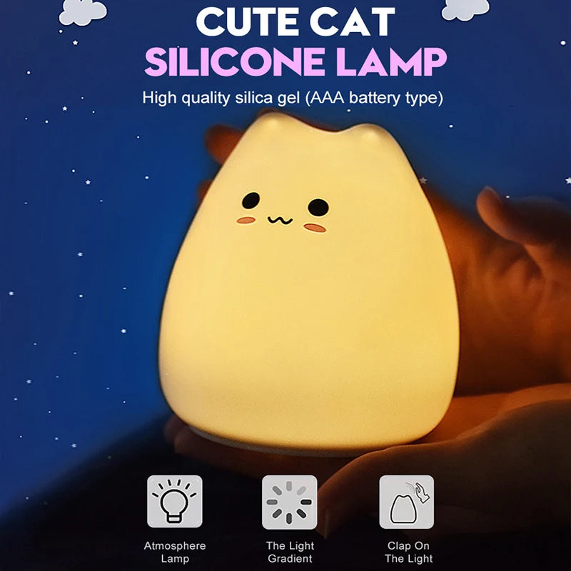 Softly glowing silicone cat night lamp on dark background with text describing its silicone build