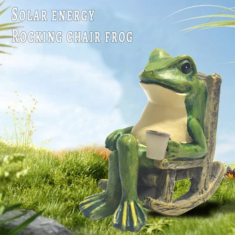 frog solar garden figurine shown in grass during the day