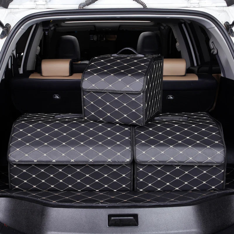 Multiple quilted car trunk organizer boxes, large and small sizes, arranged in a vehicle cargo space.
