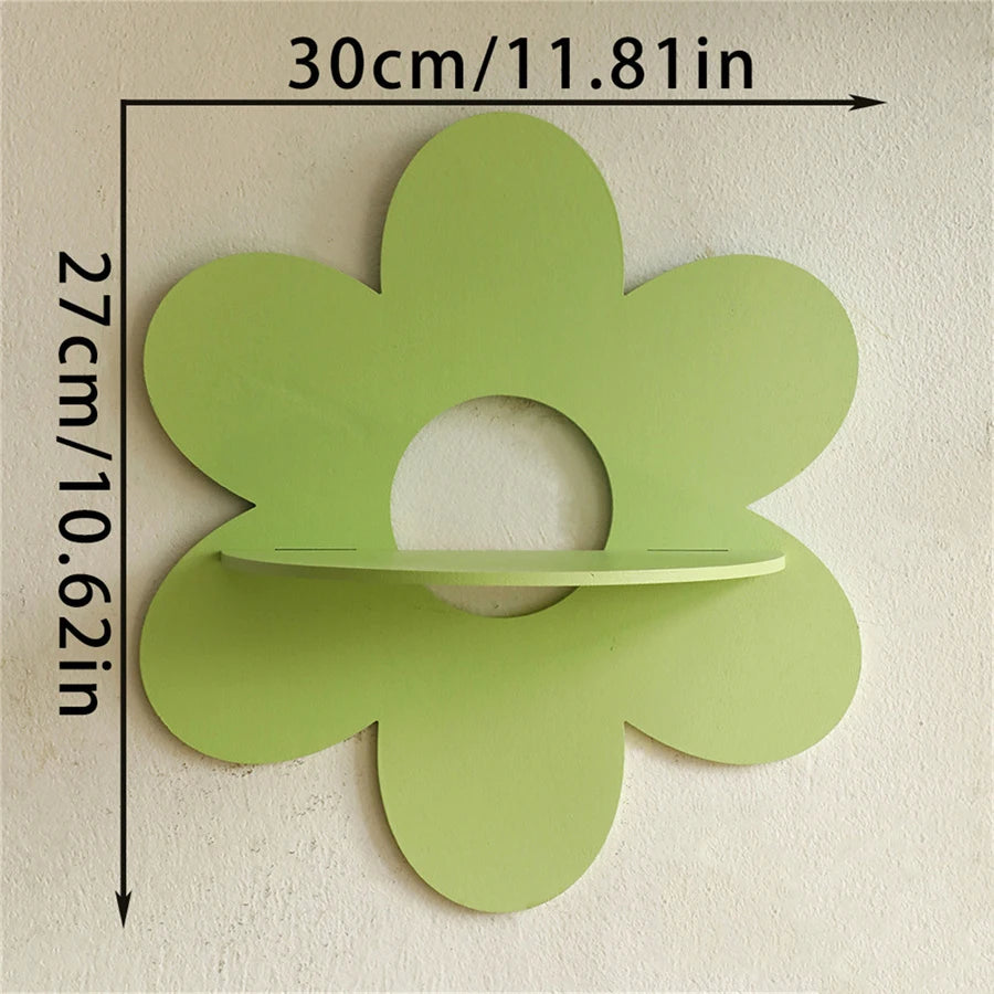 Green flower-shaped wall shelf with shelf dimensions labeled 30cm x 27cm