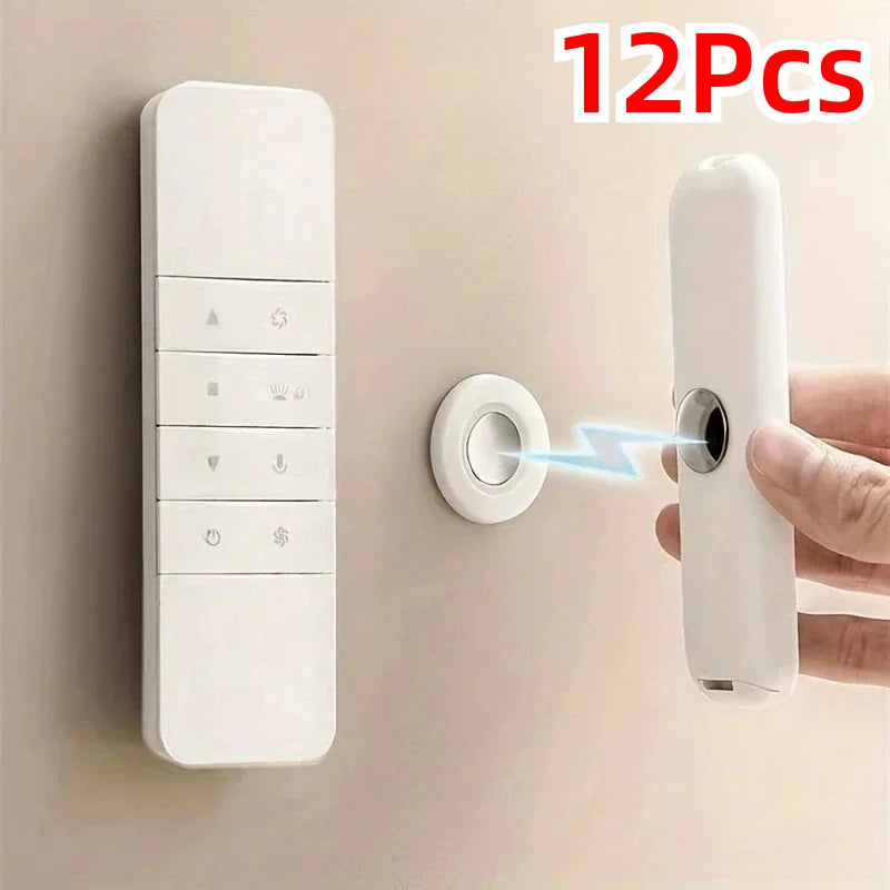 Hand attaching TV remote to round magnetic wall holder