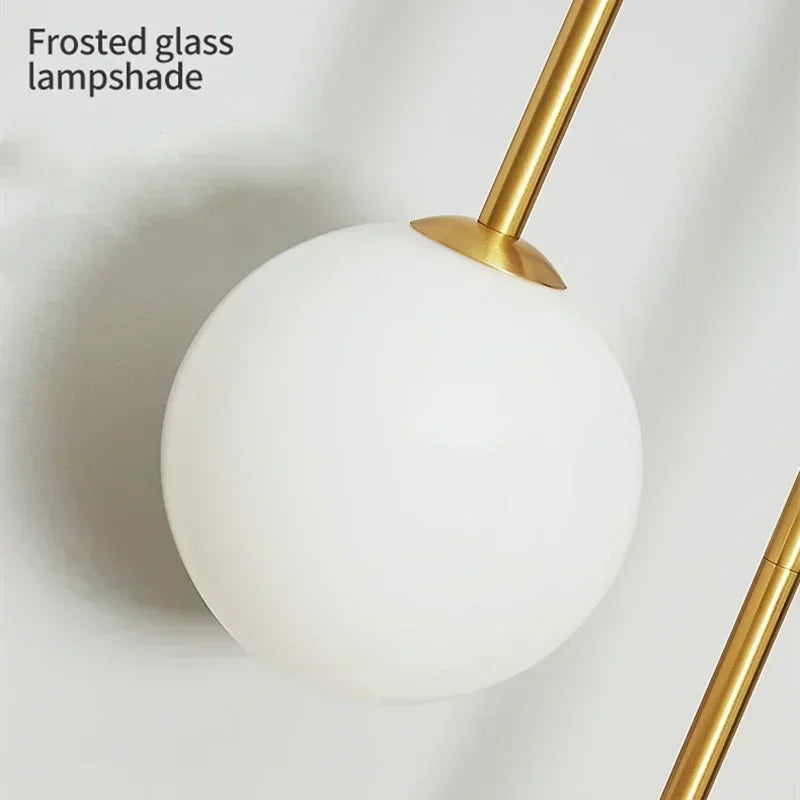 Soren Globe Glass Wall Sconce – Gold Modern Bedroom & Living Room Light
