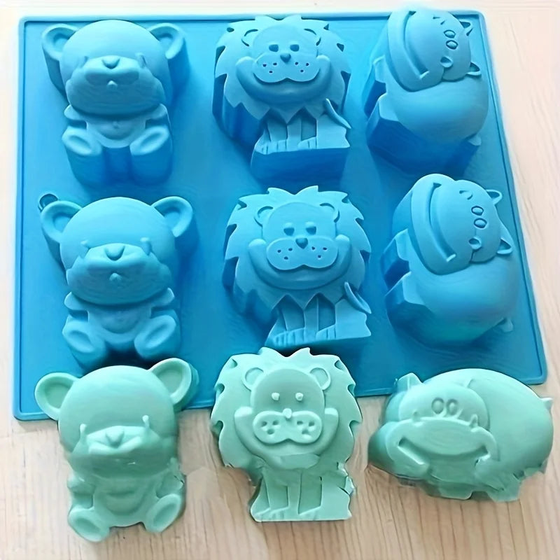 Animal silicone soap mold tray shown with finished soap shapes in bear, lion, and hippo designs
