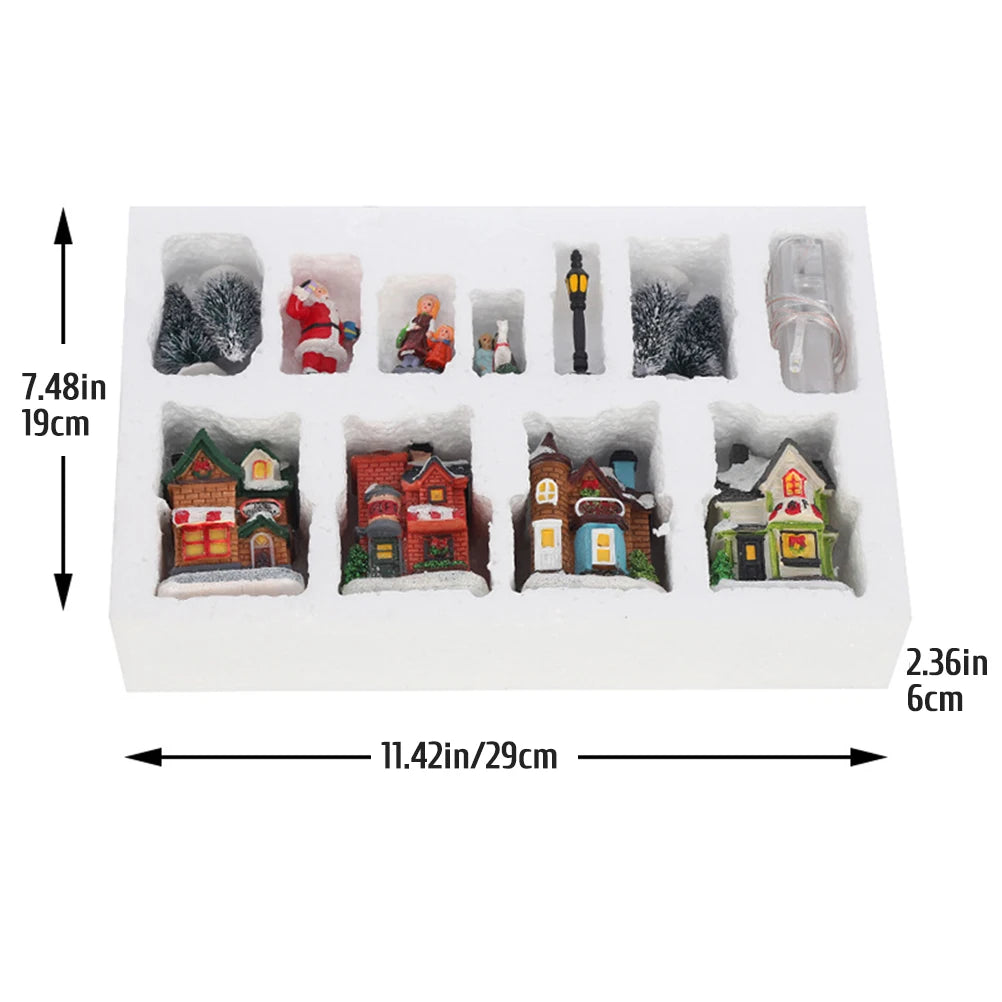 Christmas village set packaged in white foam tray with approximate dimensions labeled