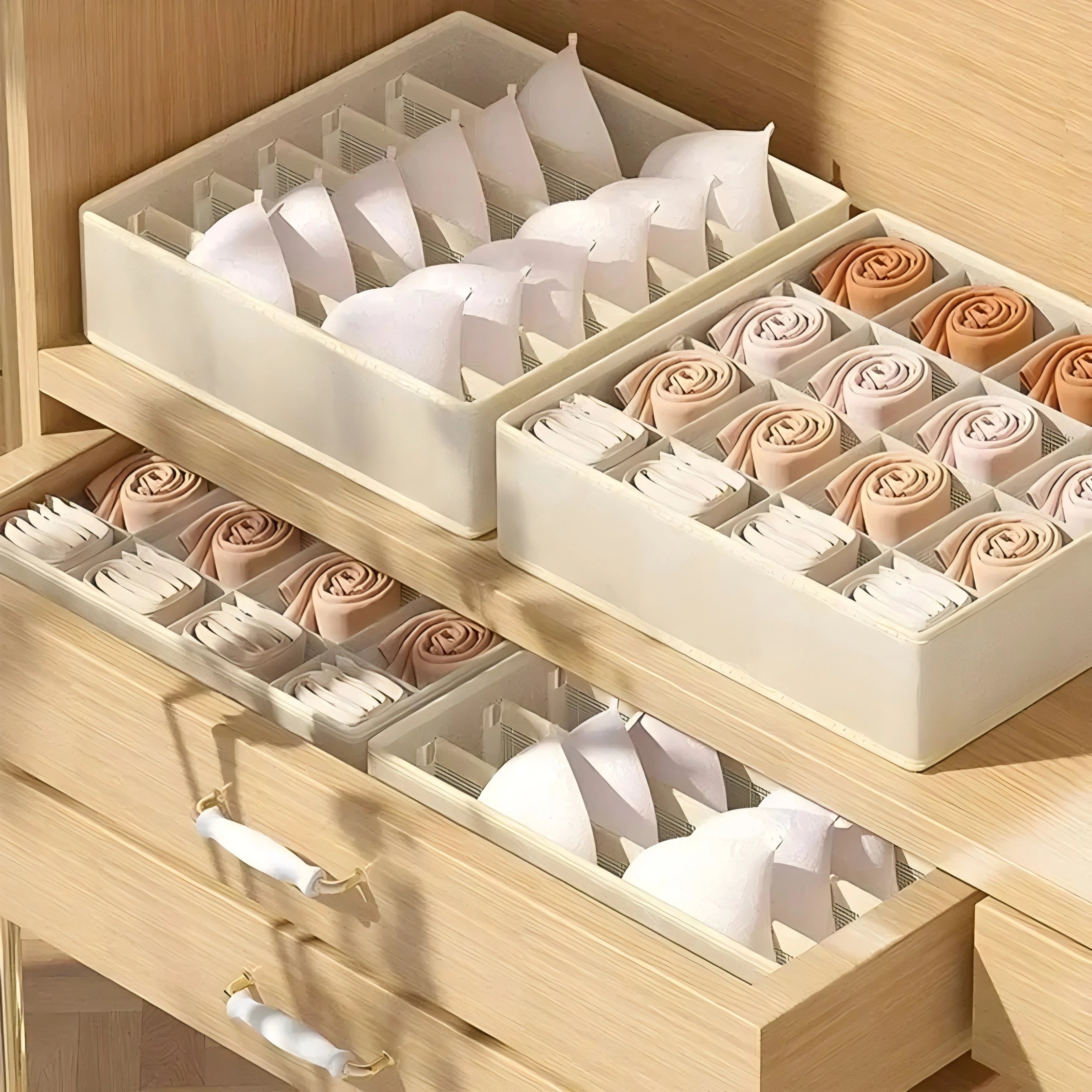 Khaki fabric grid organizers placed in bedroom wooden drawers, sorted by socks and bras