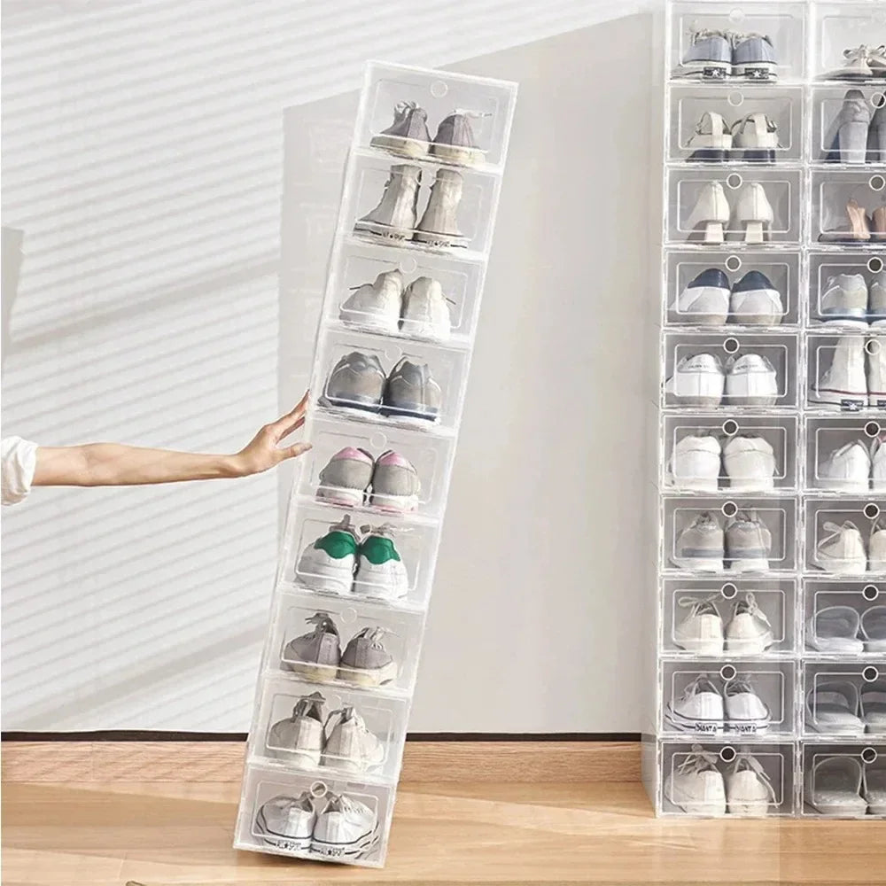 Person easily holding and moving a vertical row of six clear plastic shoe boxes filled with shoes