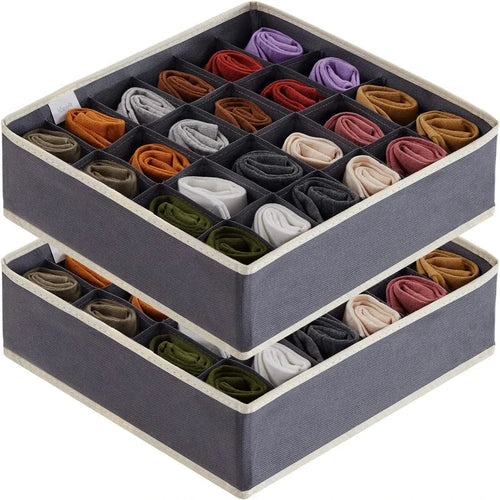 Two stackable gray 24-grid sock and underwear drawer organizer bins filled with rolled socks in assorted colors
