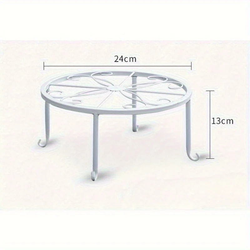 Round metal plant stand in white, showing 24cm diameter and 13cm height measurements