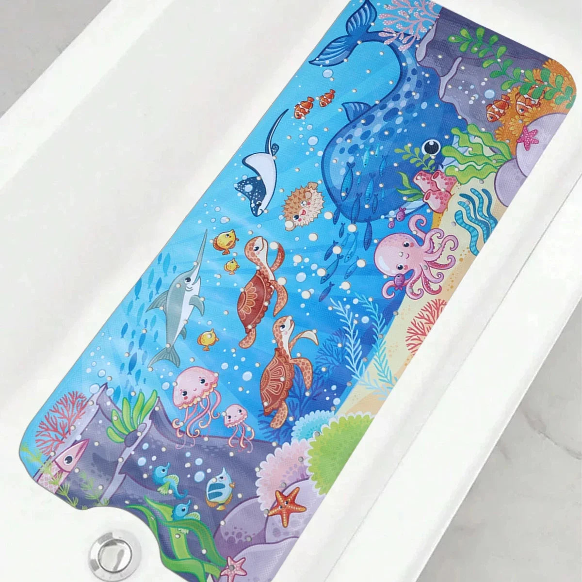 Colorful ocean-themed extra-long non-slip bath mat laid flat in a white bathtub