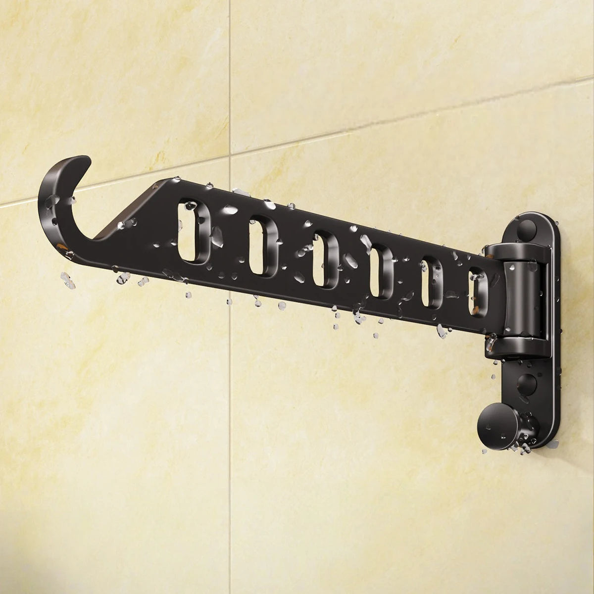 Matte black foldable drying rack with water drops on a tiled bathroom wall