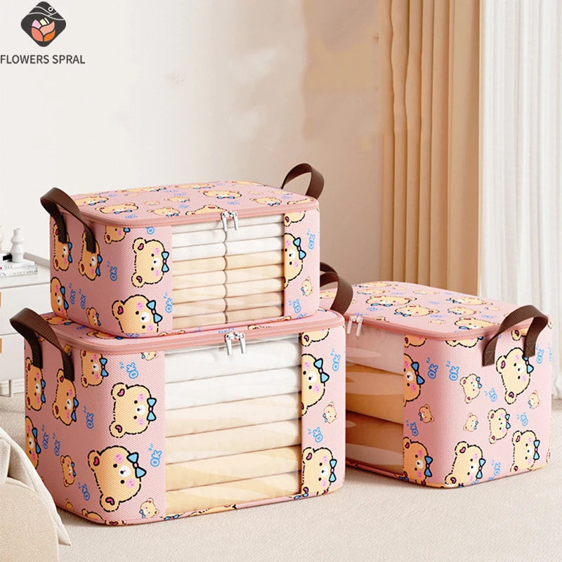 Three bear print foldable storage bags with clear windows, filled with neatly stacked bedding, displayed in a cozy bedroom setting