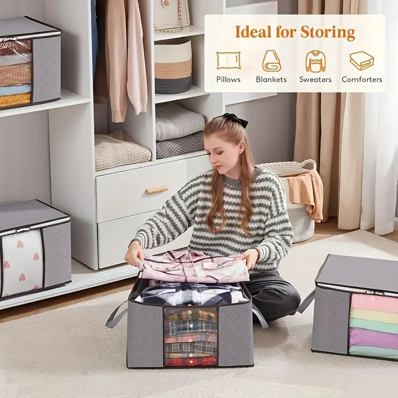 Person placing folded clothes into a gray storage bag, surrounded by neatly organized closet and additional storage bags.