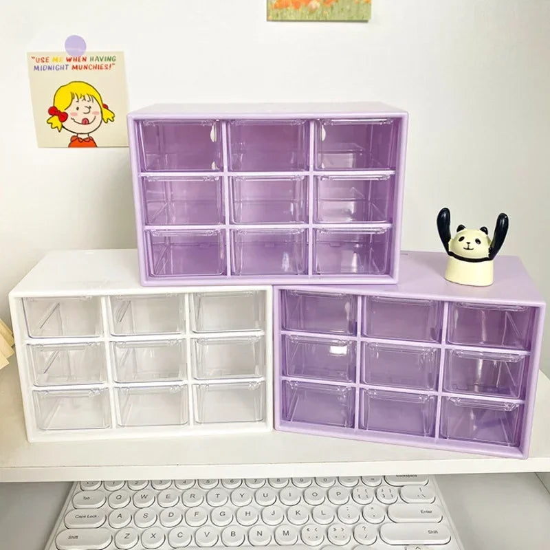 Purple and white 9-drawer organizers displayed on a desktop workspace