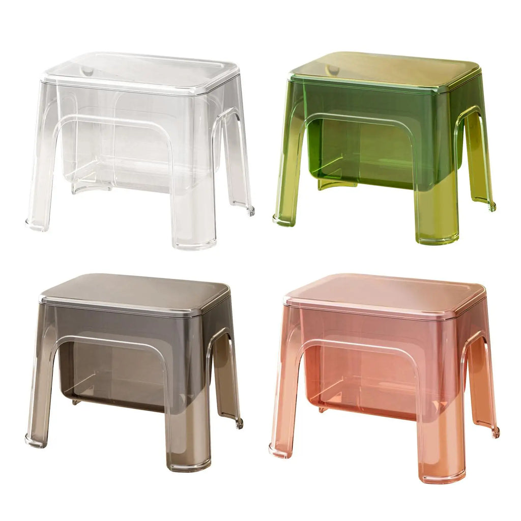 Four transparent PETG storage step stools in clear, green, gray, and pink—lid closed