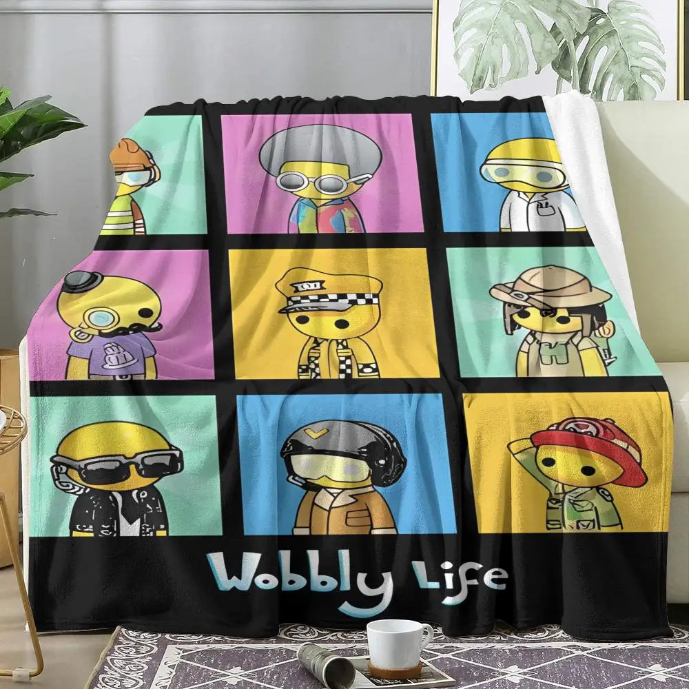 Wobbly Life character print flannel throw blanket draped on a sofa in a modern living room setting