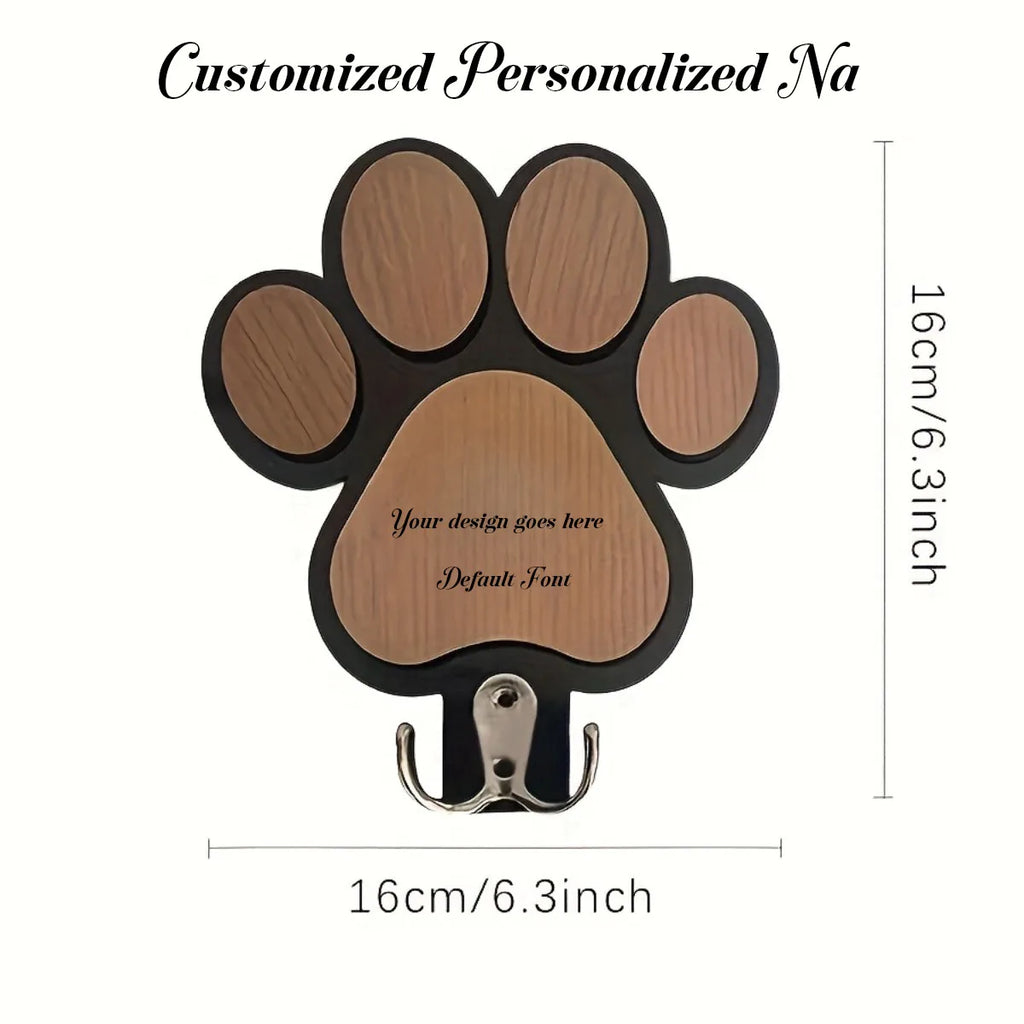 Black paw print wooden leash hook with metal double hook, showing 16cm by 16cm dimensions