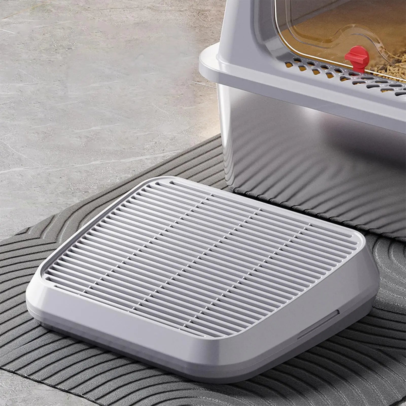 Double-layer light gray cat litter catcher ramp placed in front of a litter box