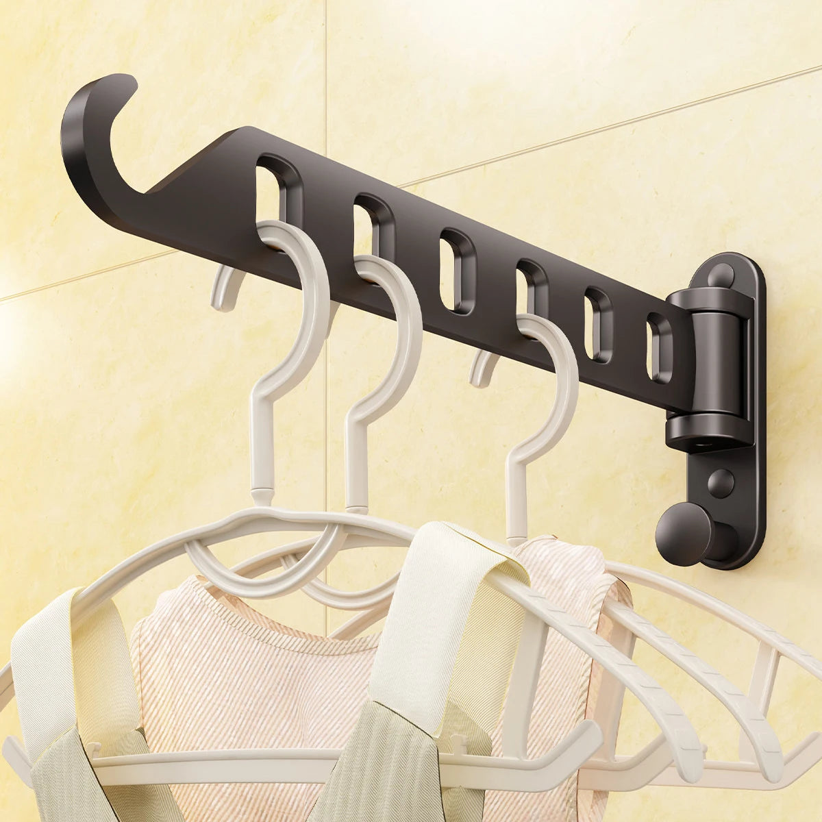 Black wall-mounted foldable clothes drying rack with 6 slots in use