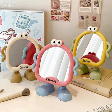 group of cute cartoon frame mirrors in yellow, pink, and cream on table