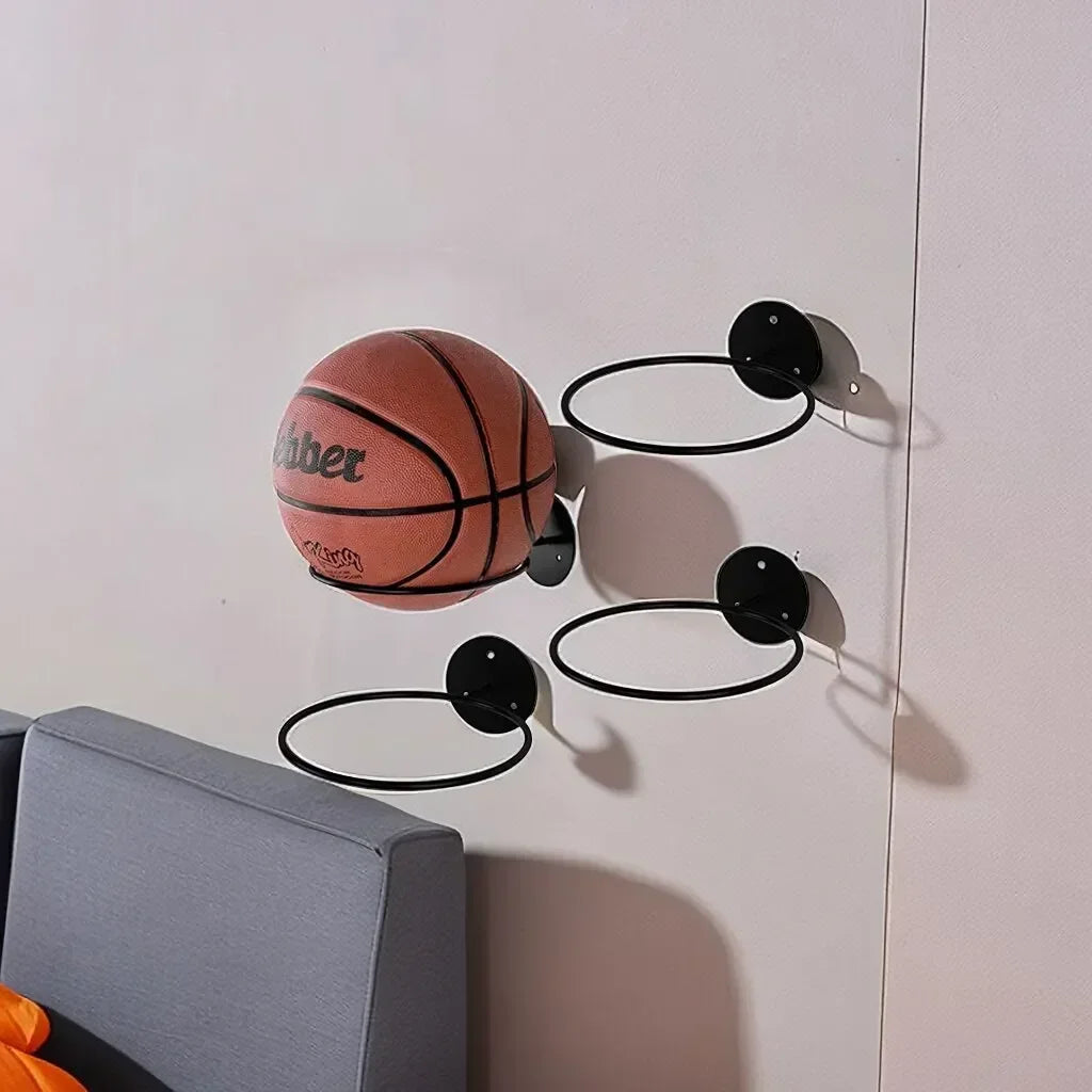 Set of metal wall-mounted racks with a basketball stored above a grey sofa